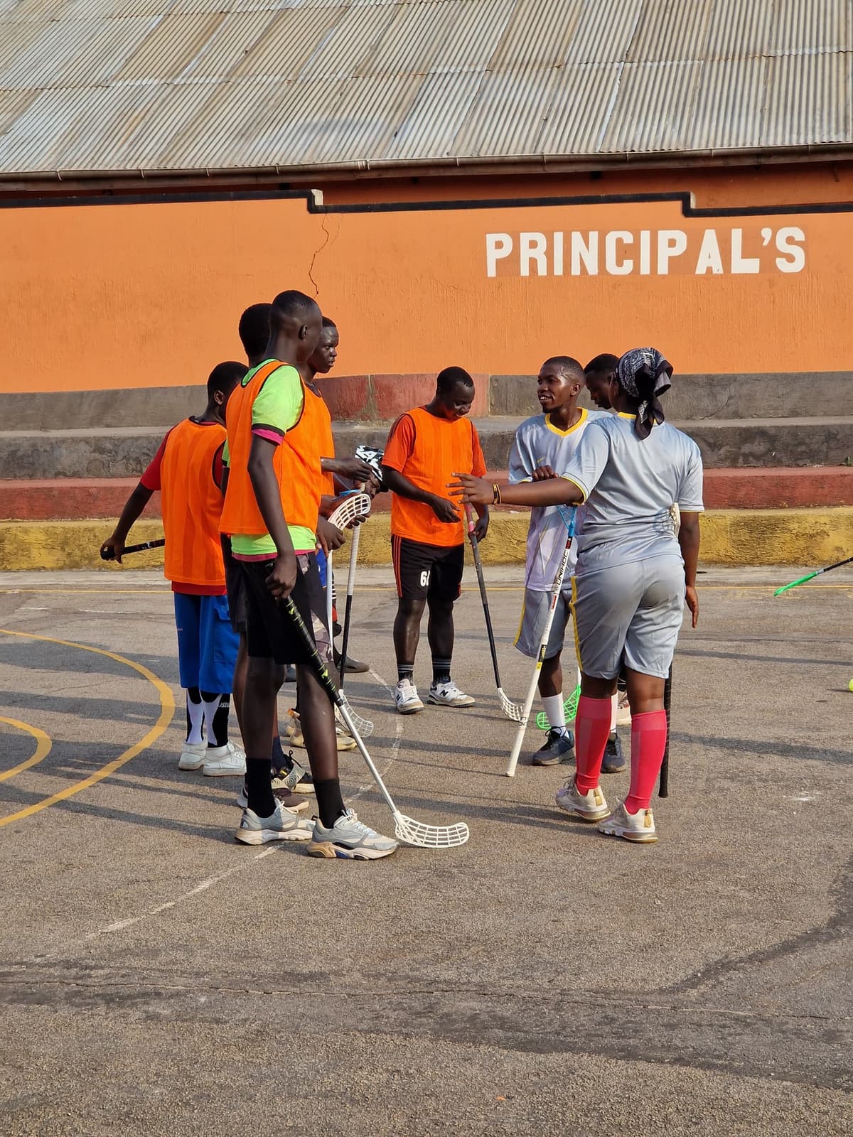 Team gathered together after a floorball clinic